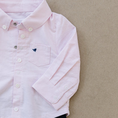 Preppy pink baby oxford shirt made by London Lark. Baby outfit is made from cotton with bamboo onesie underneath.