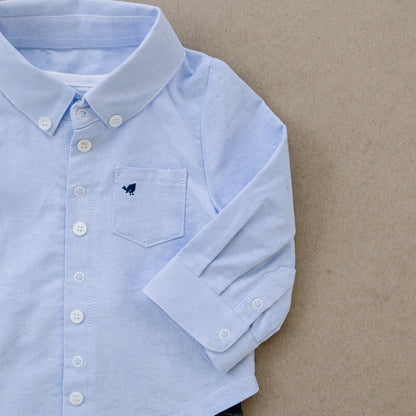 Stylish baby boy clothes by London Lark featuring a blue baby oxford shirt and jeans. London Lark makes 0-3 month clothes.