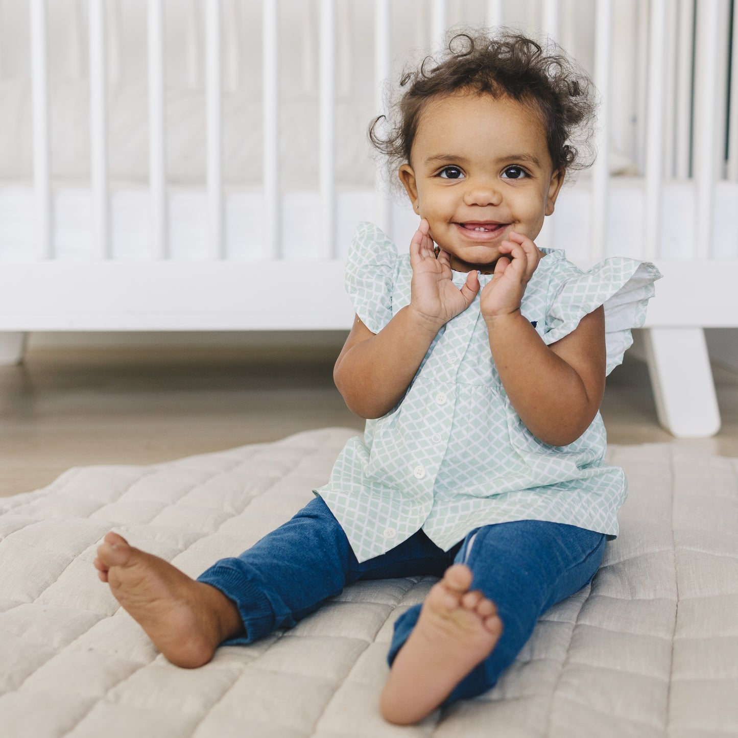 Adorable girl wearing a preppy outfit for babies by London Lark. Perfect spring outfit for baby girls. Size 3-6 month outfits.